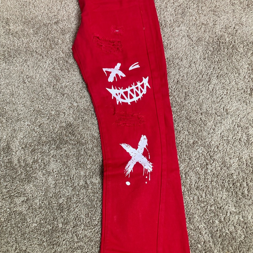 Red jeans with design
